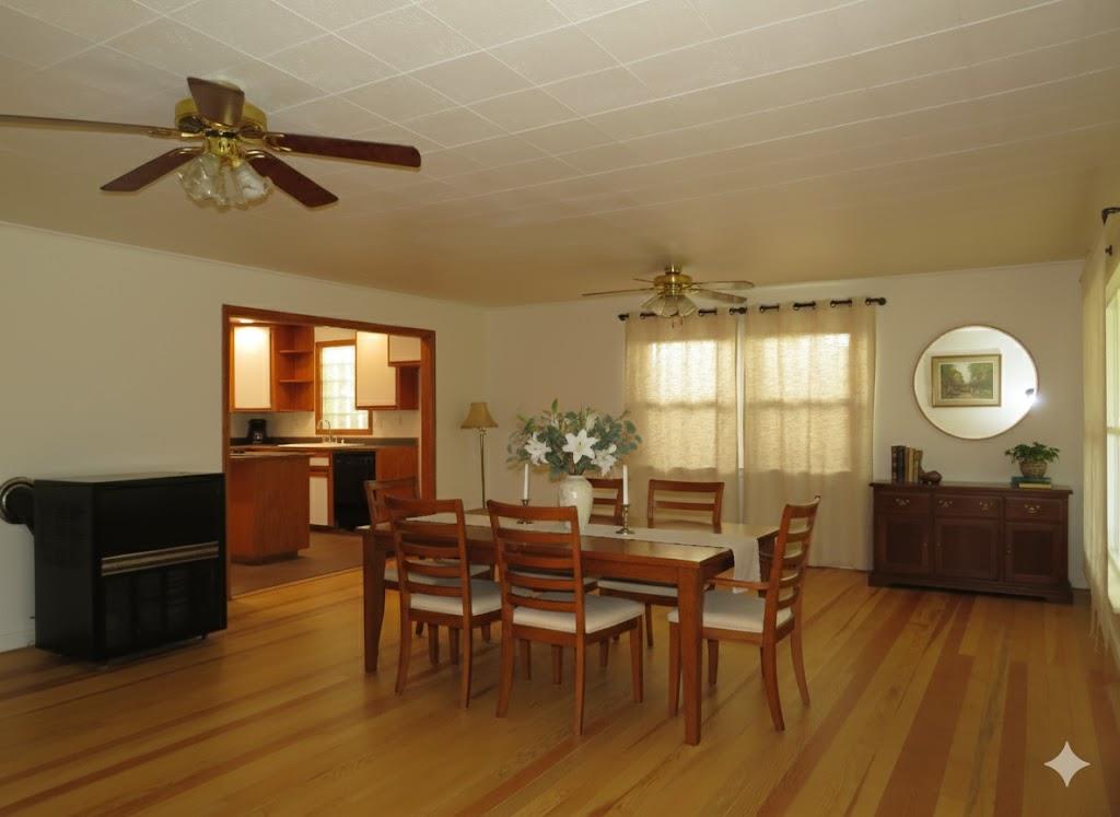 320 Pleasant Street Colfax, CA 95713 - Photo 5 of 49 a view of a dining room with furniture and wooden floor
