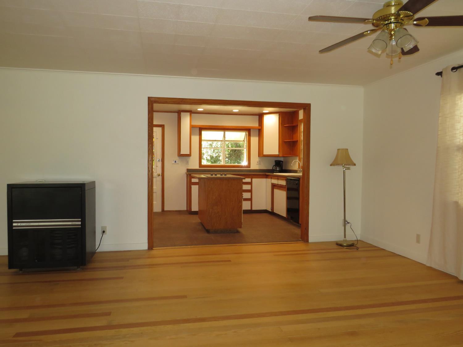 320 Pleasant Street Colfax, CA 95713 - Photo 7 of 49 a bedroom with a bed and a dresser