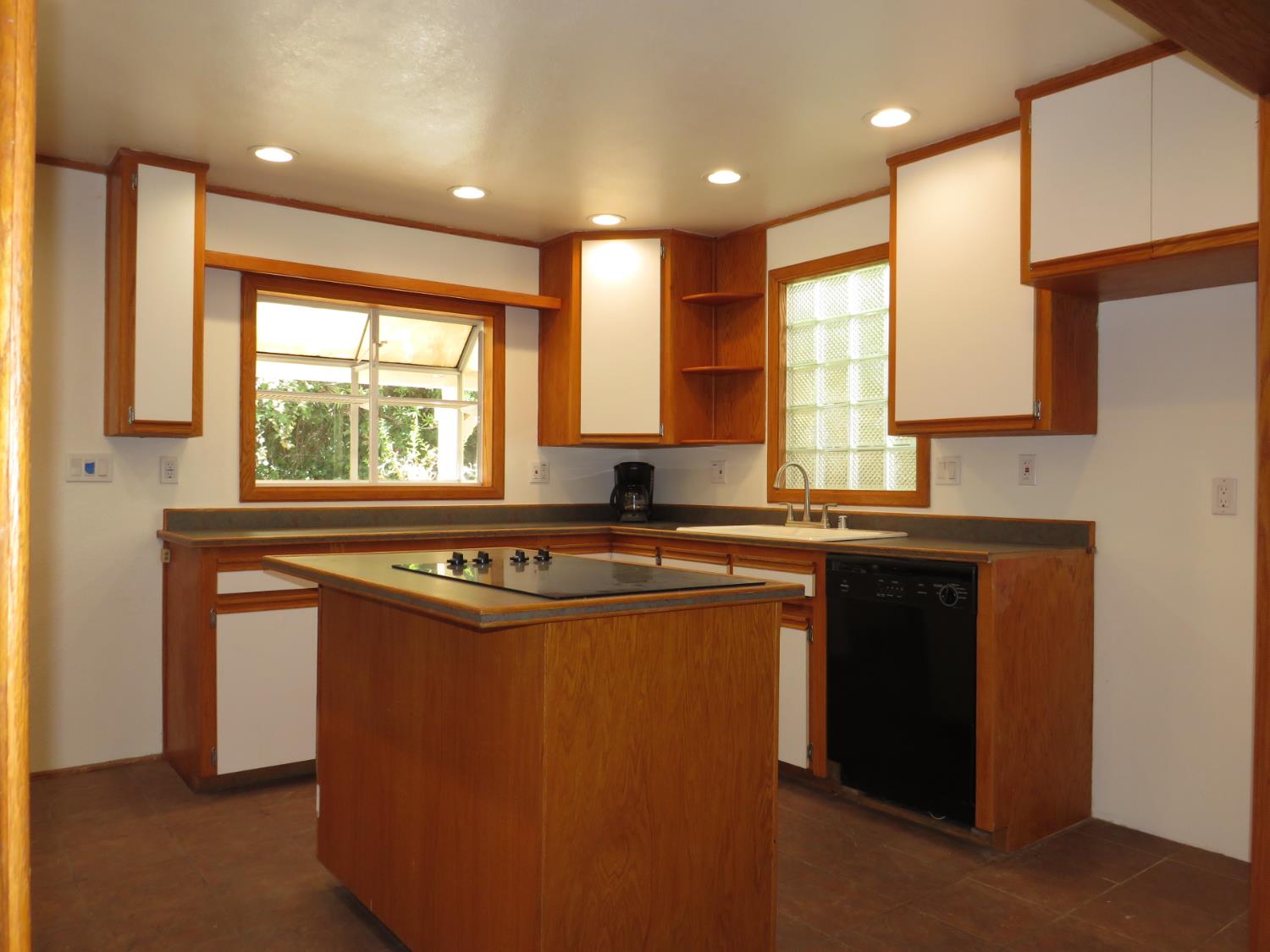 320 Pleasant Street Colfax, CA 95713 - Photo 8 of 49 a kitchen with stainless steel appliances granite countertop a sink a stove and a refrigerator