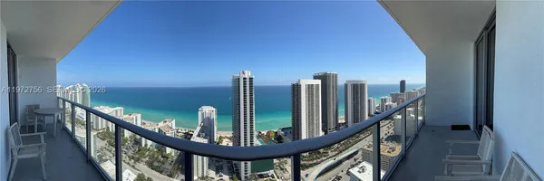a view of a balcony with staircase