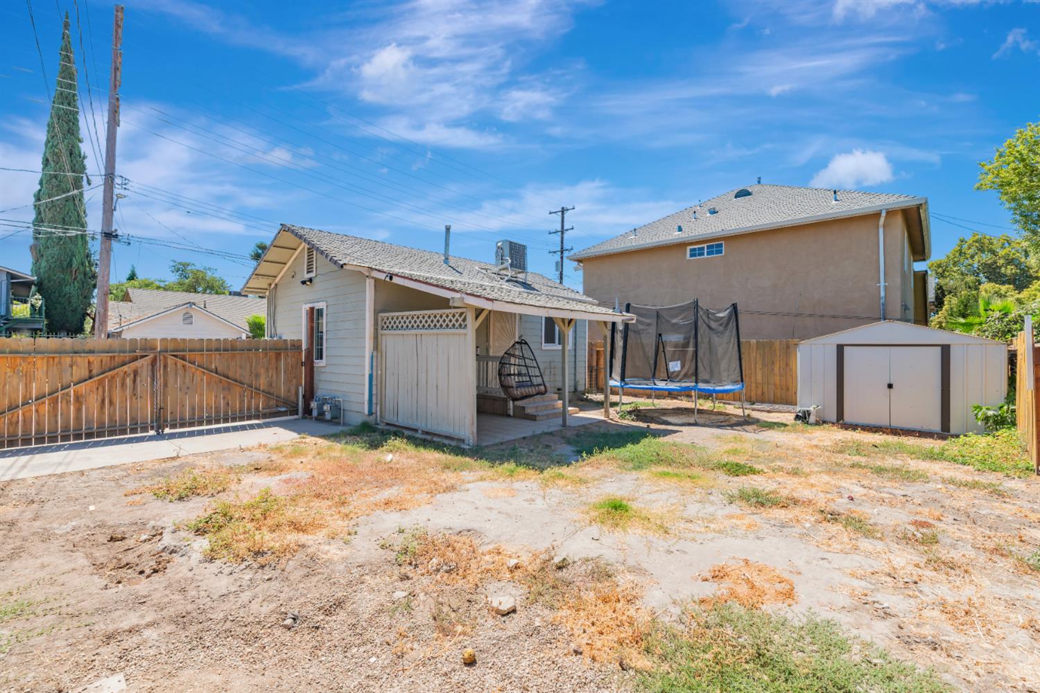 536 Locust Street Lodi, CA 95240 - Photo 15 of 18 a view of a house with a patio