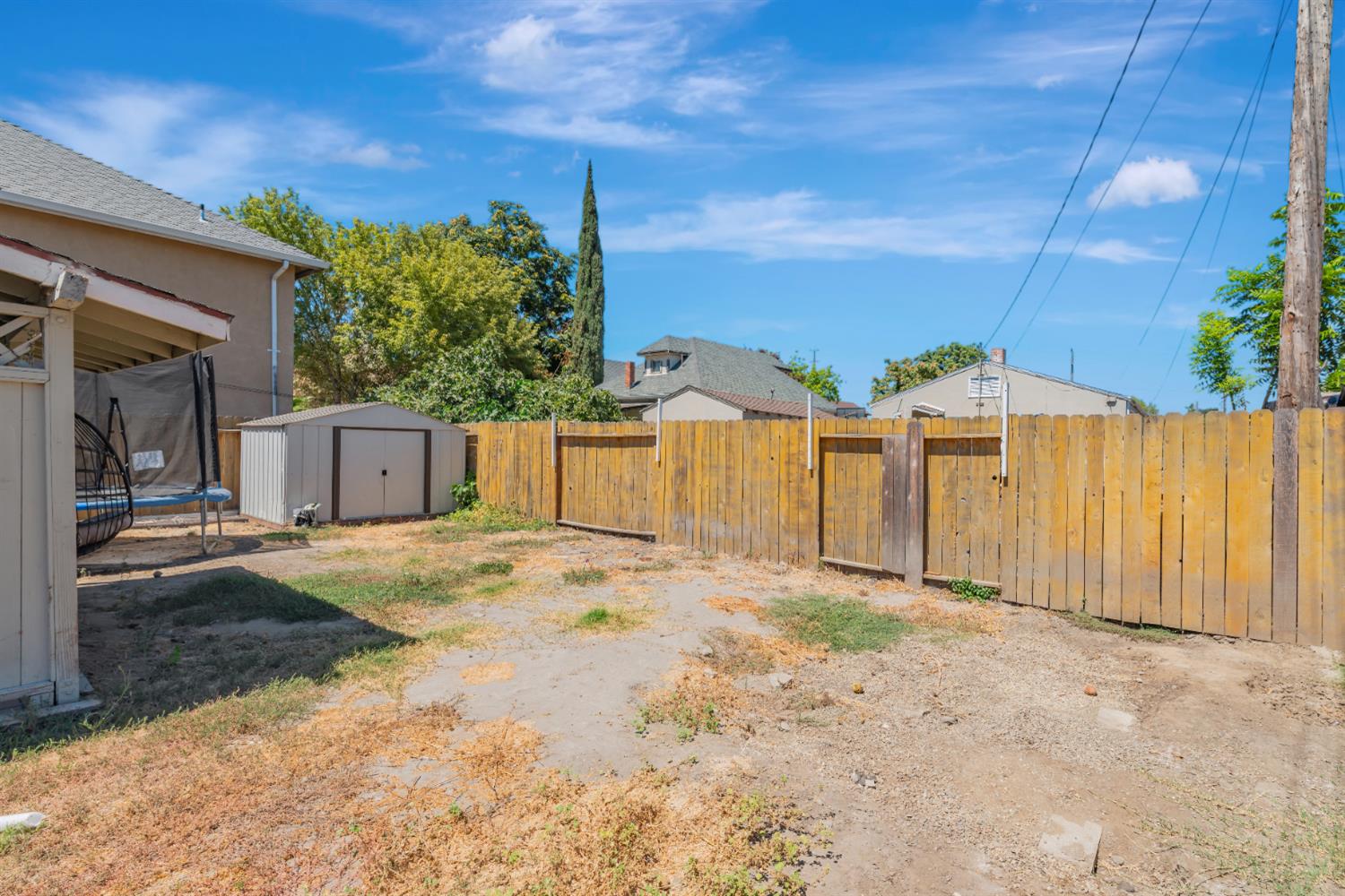 536 Locust Street Lodi, CA 95240 - Photo 16 of 18 a view of a backyard of the house