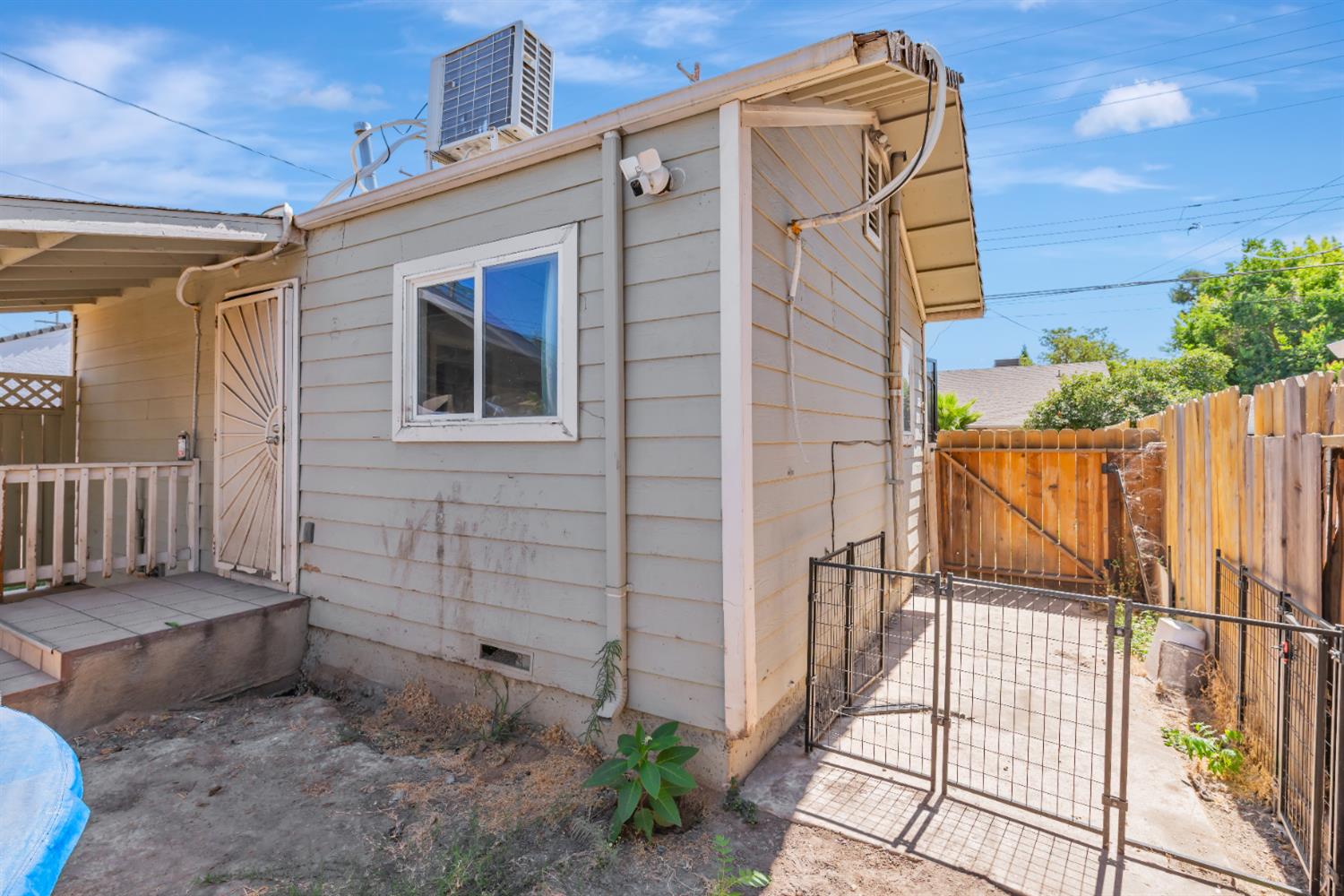 536 Locust Street Lodi, CA 95240 - Photo 17 of 18 a view of a house with a small yard