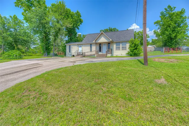 a view of road and grass