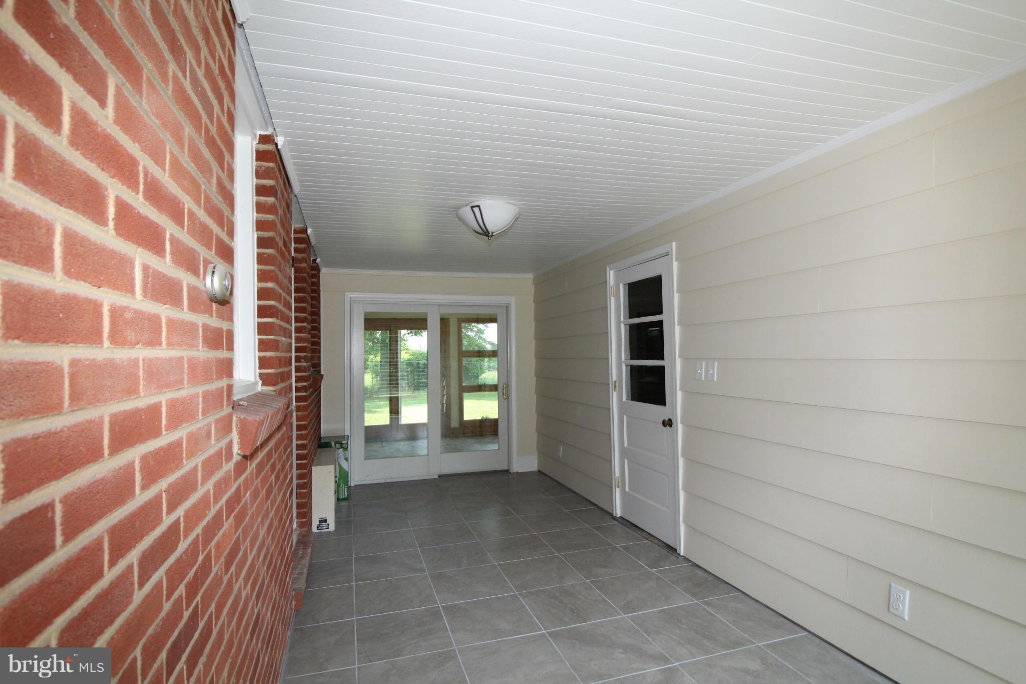 6137 Telegraph Road Elkton, MD 21921 - Photo 14 of 29 Enclosed area between Garage and House, heated