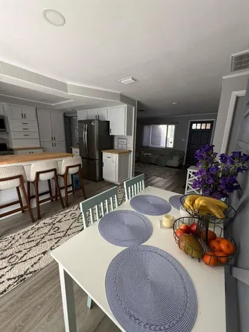 a kitchen with a stove and a microwave