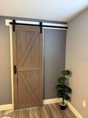a bathroom with a shower curtain and a sink