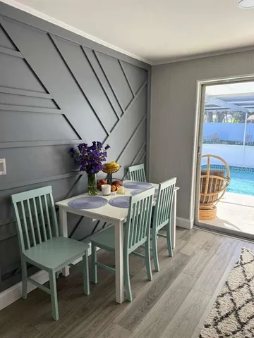 a kitchen with stainless steel appliances granite countertop a stove and a refrigerator