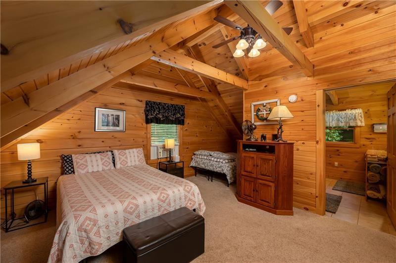 3906 Master Road Emlenton, PA 16373 - Photo 16 of 31 a bedroom with a bed and cabinets