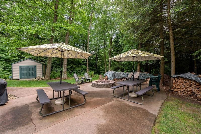 3906 Master Road Emlenton, PA 16373 - Photo 25 of 31 a view of backyard with outdoor seating and trees