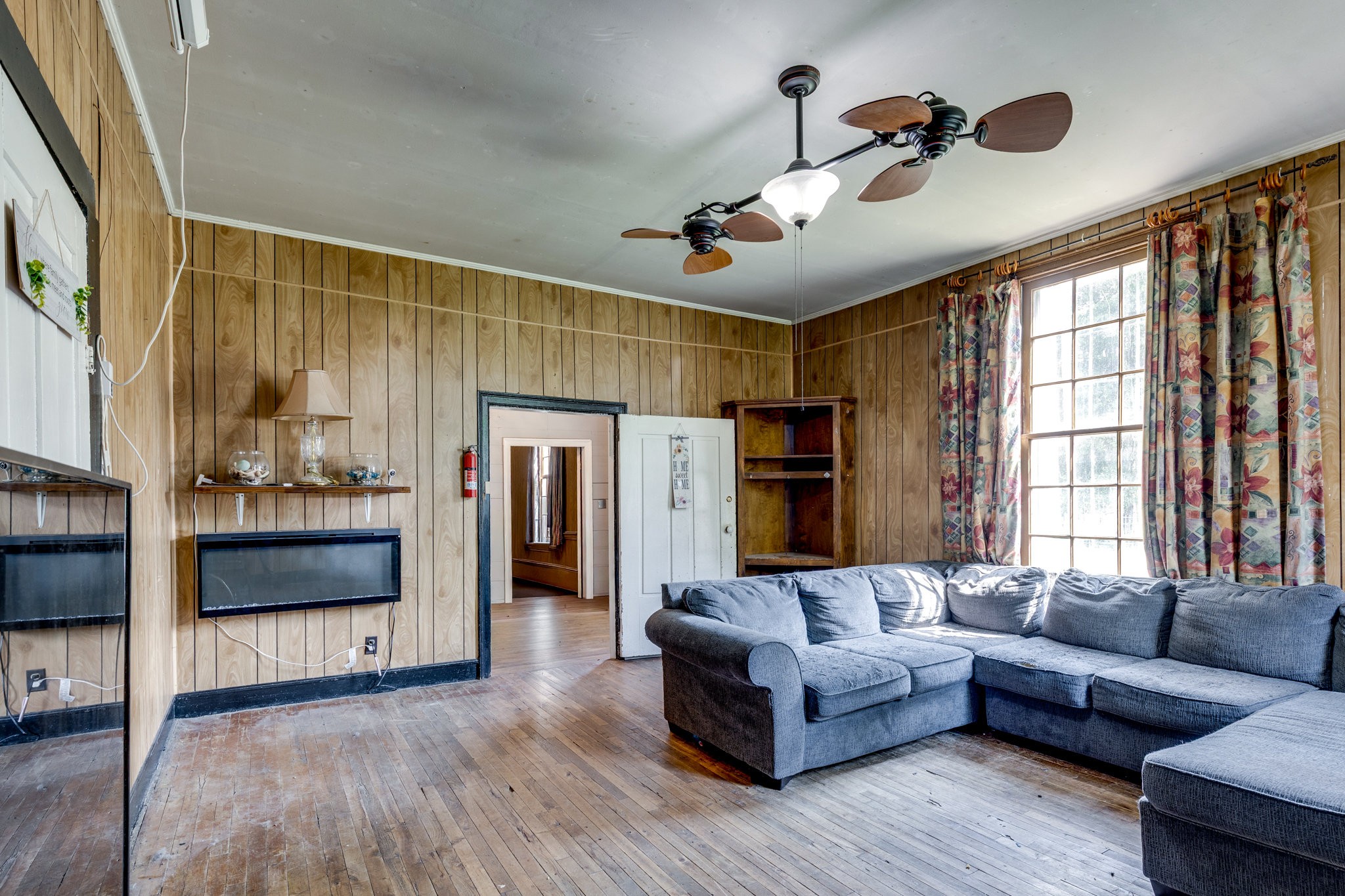 2012 Hoovers Road Duck River, TN 38454 - Photo 13 of 48 a living room with furniture and a flat screen tv