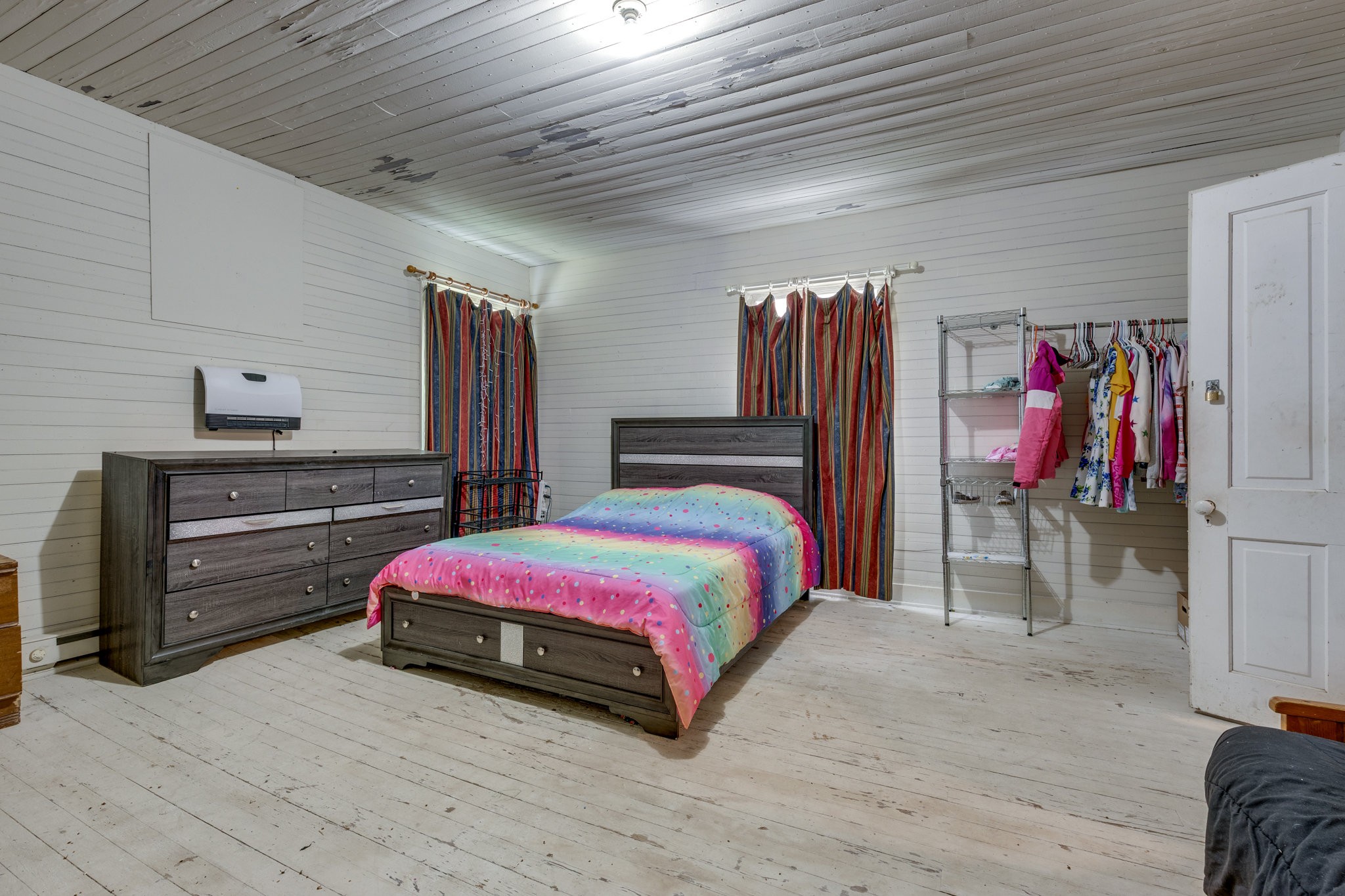 2012 Hoovers Road Duck River, TN 38454 - Photo 31 of 48 a bedroom with a bed and a walk in closet