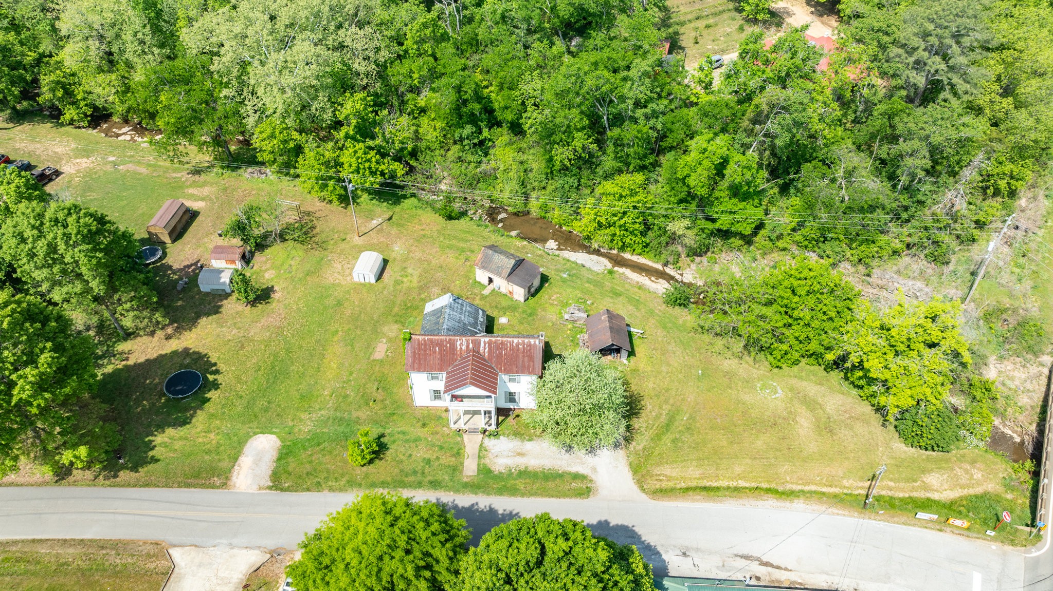2012 Hoovers Road Duck River, TN 38454 - Photo 48 of 48 an aerial view of residential house with outdoor space and trees all around