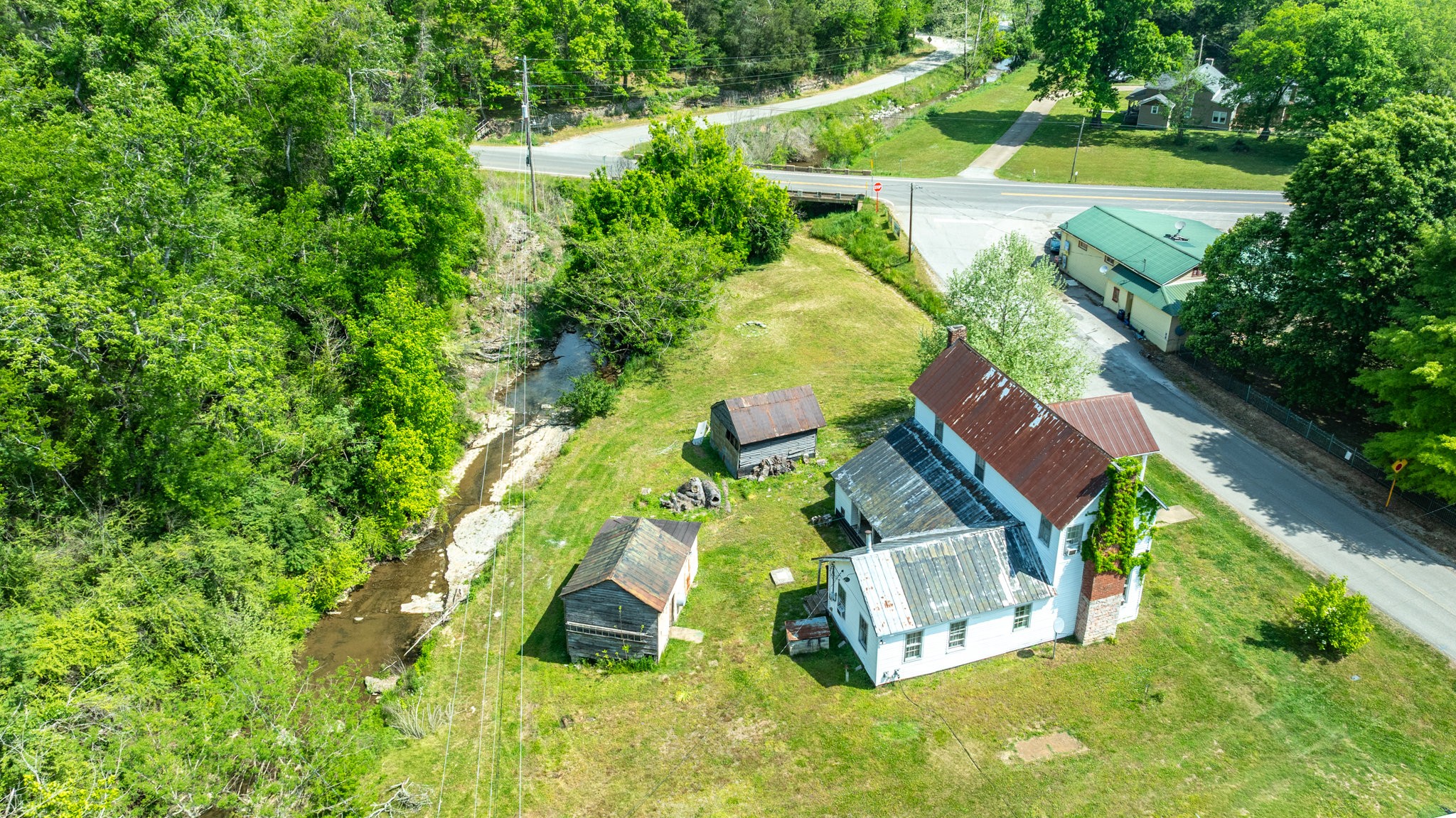 2012 Hoovers Road Duck River, TN 38454 - Photo 5 of 48 an aerial view of residential house with outdoor space and trees