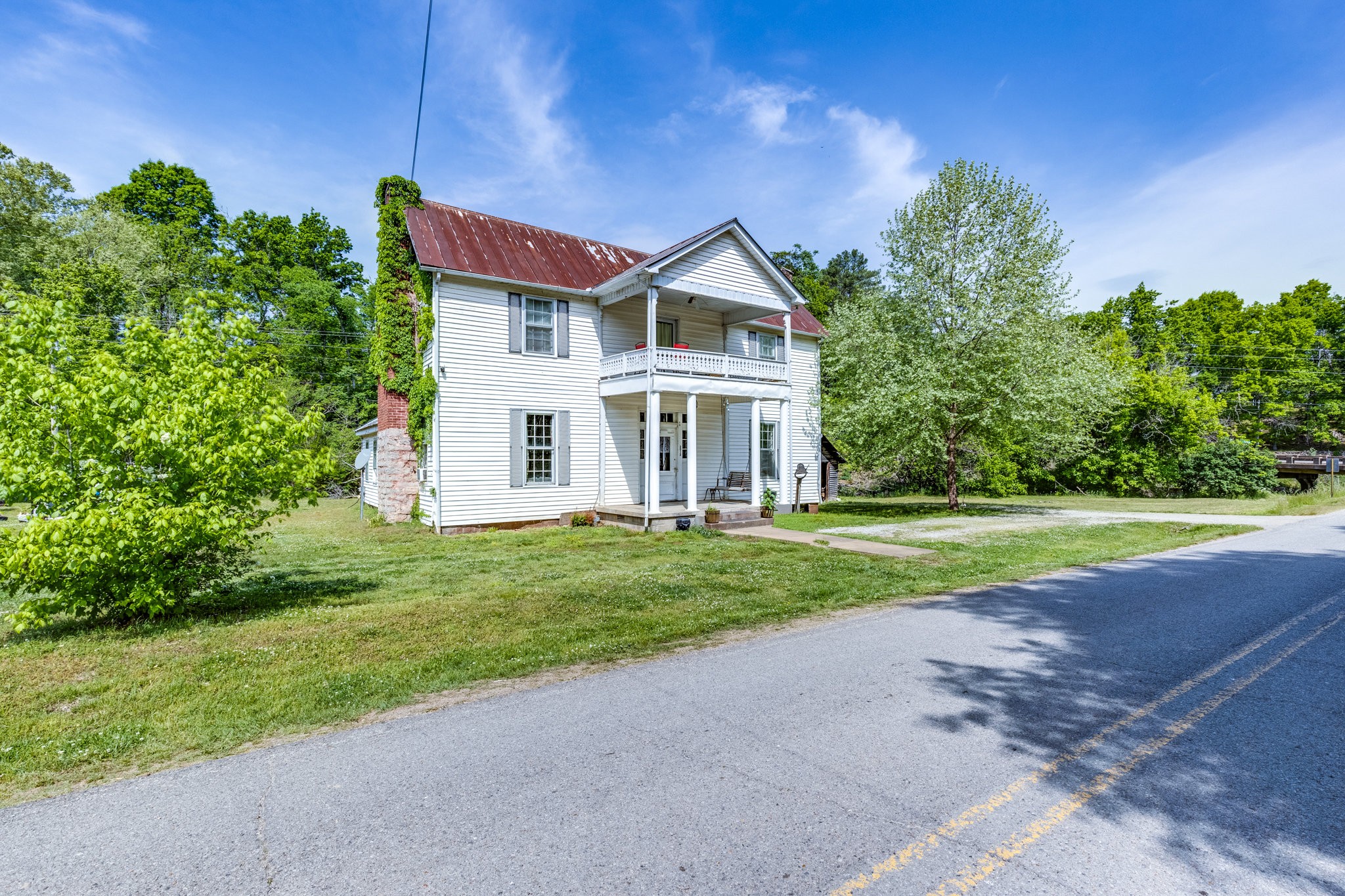 2012 Hoovers Road Duck River, TN 38454 - Photo 7 of 48 a view of a house with a yard