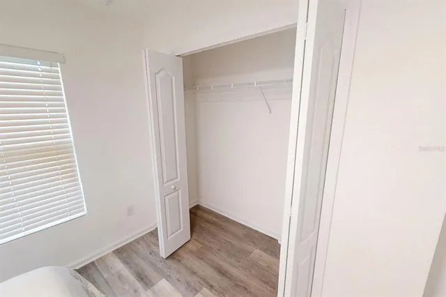 a bathroom with a sink toilet a shower and a mirror