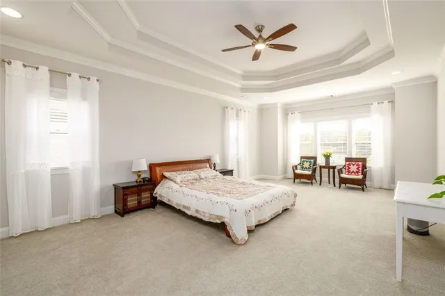 a spacious bathroom with a granite countertop sink and a mirror