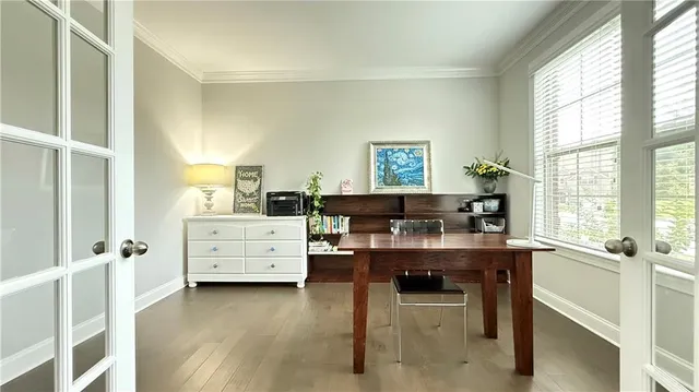 a workspace with furniture and window