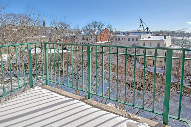 a view of a building from a balcony