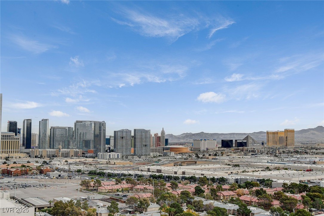 4381 West Flamingo Road, Unit 2202 Las Vegas, NV 89103 - Photo 40 of 40 View of city skyline featuring a mountainous background