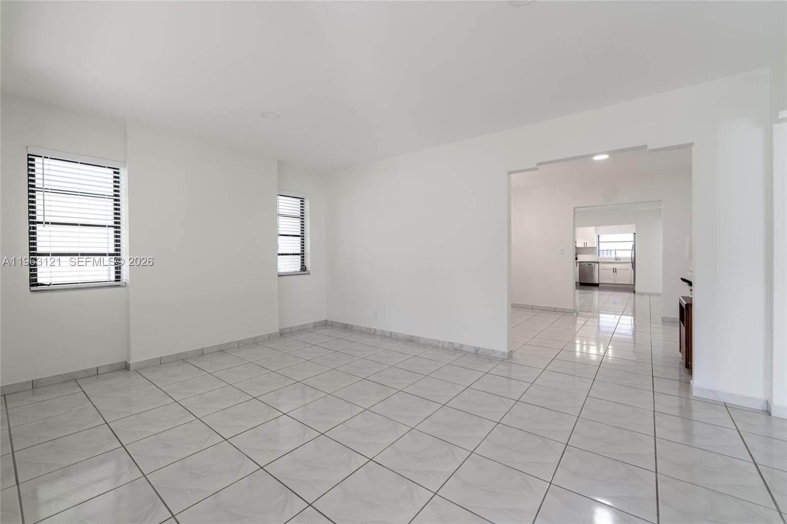1631 Southwest 21st Street Miami, FL 33145 - Photo 18 of 58 an empty room with windows and entrance