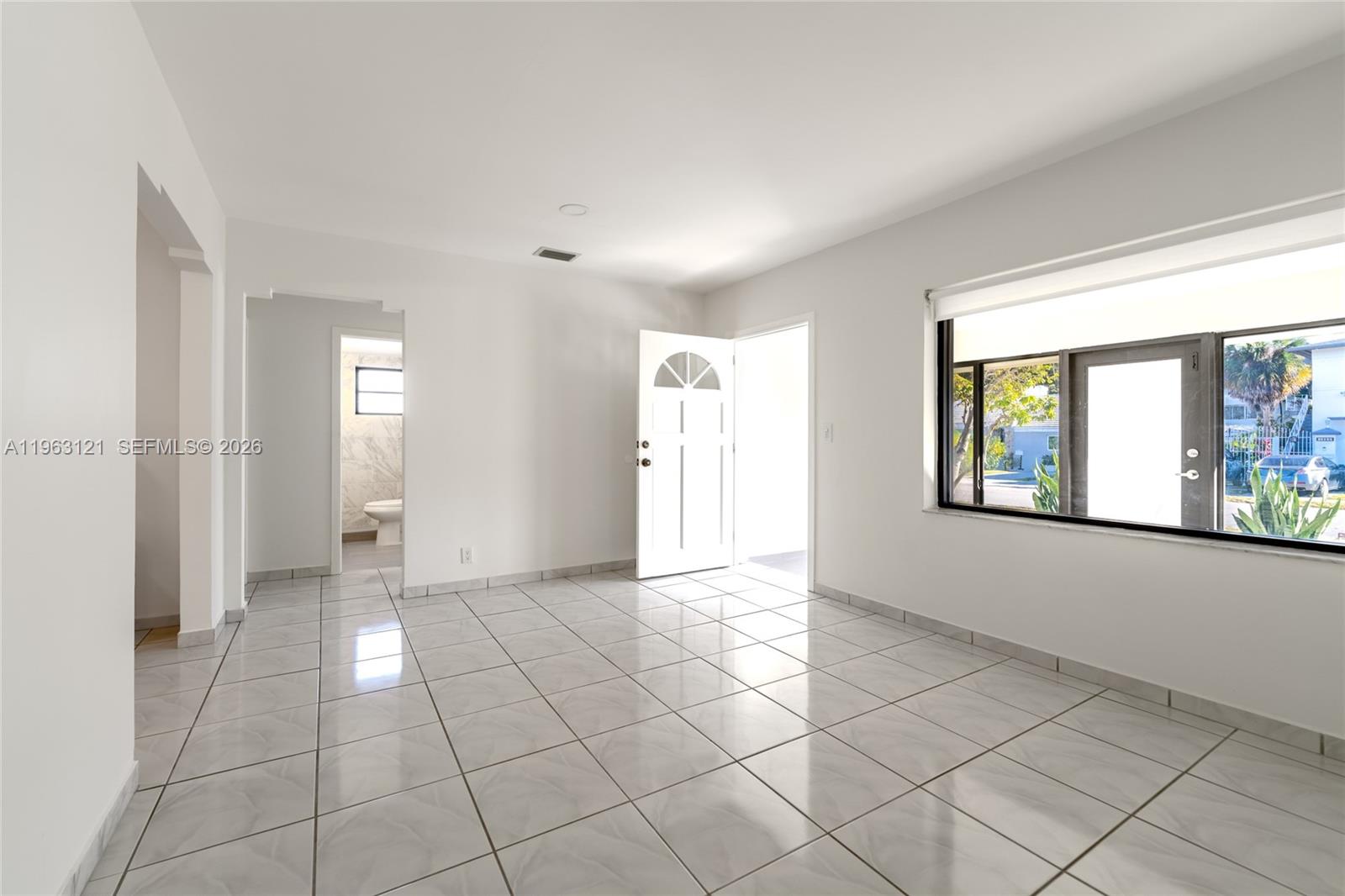 1631 Southwest 21st Street Miami, FL 33145 - Photo 19 of 58 a view of an empty room and window