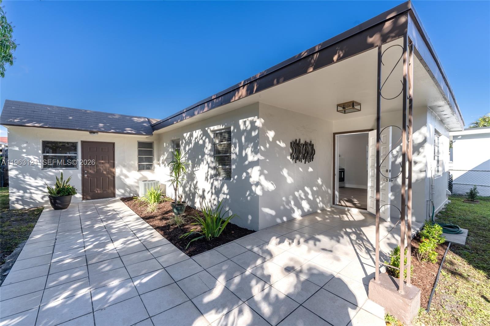 1631 Southwest 21st Street Miami, FL 33145 - Photo 2 of 58 a view of a house with patio