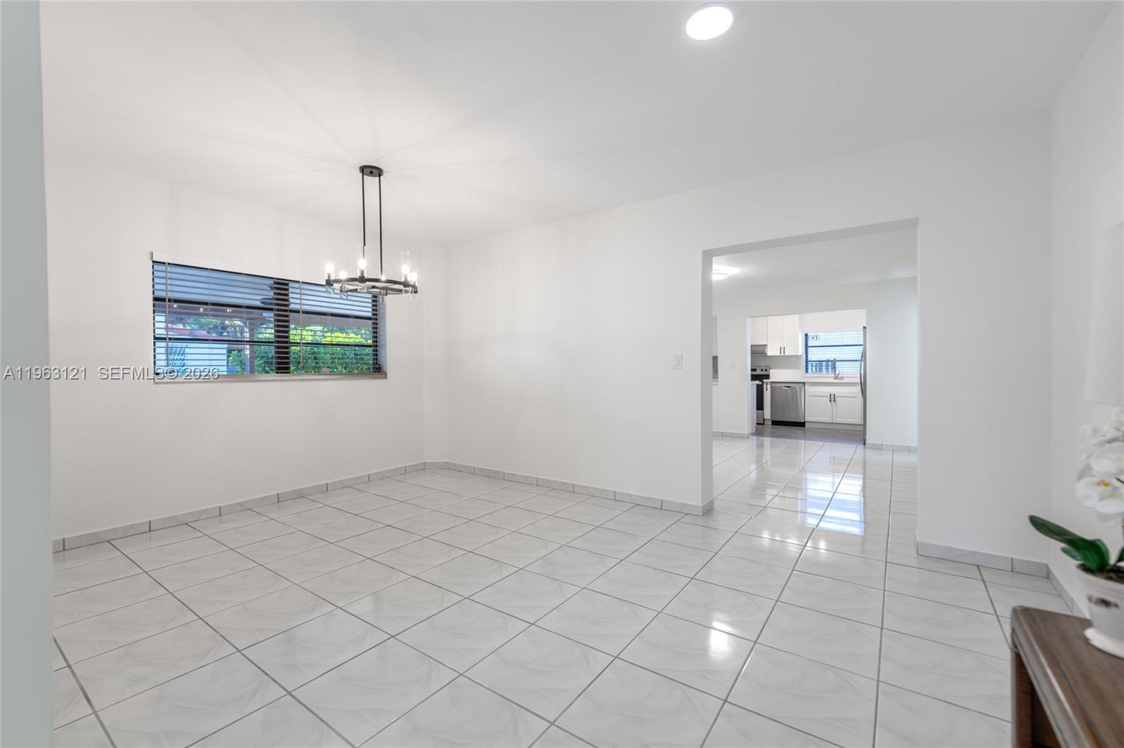 1631 Southwest 21st Street Miami, FL 33145 - Photo 21 of 58 a view of a room with window and furniture