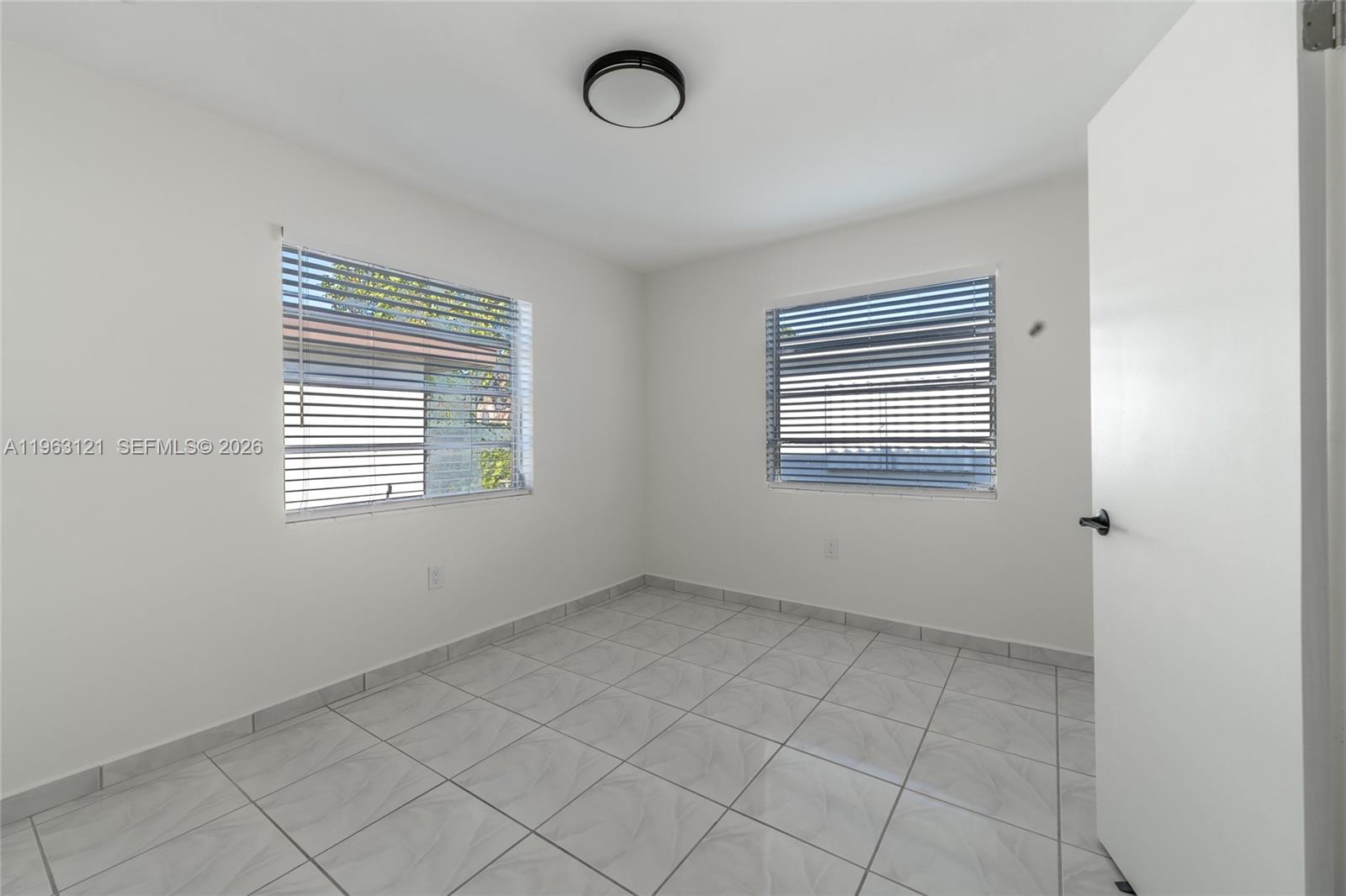 1631 Southwest 21st Street Miami, FL 33145 - Photo 26 of 58 an empty room with windows