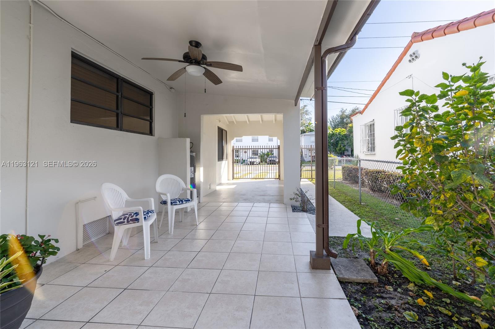 1631 Southwest 21st Street Miami, FL 33145 - Photo 40 of 58 a lobby with furniture and potted plants