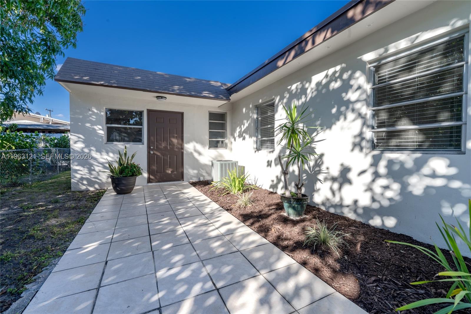 1631 Southwest 21st Street Miami, FL 33145 - Photo 46 of 58 a view of a house with a yard