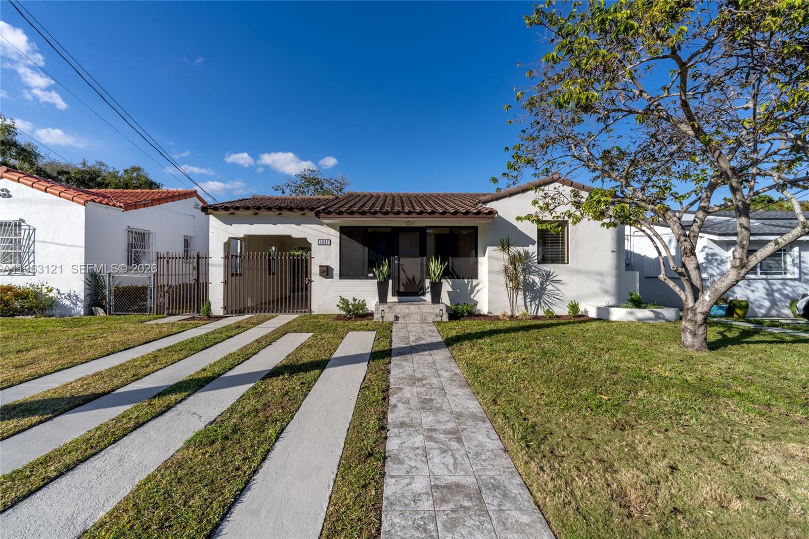 1631 Southwest 21st Street Miami, FL 33145 - Photo 8 of 58 a view of a house with backyard porch and sitting area