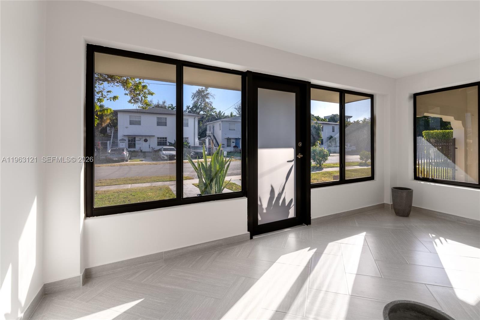 1631 Southwest 21st Street Miami, FL 33145 - Photo 9 of 58 a view of a room with a large window