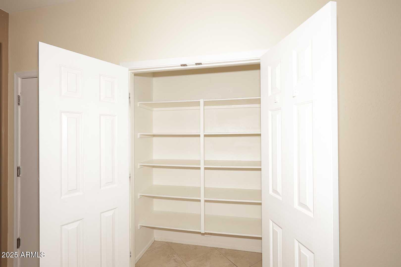 11020 East Shepperd Avenue Mesa, AZ 85212 - Photo 15 of 37 a view of a room with empty racks