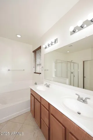a bathroom with a shower and a tub
