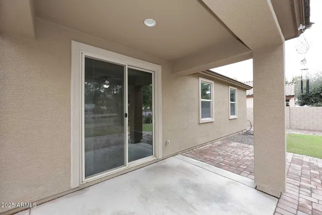 a view of a park with large trees