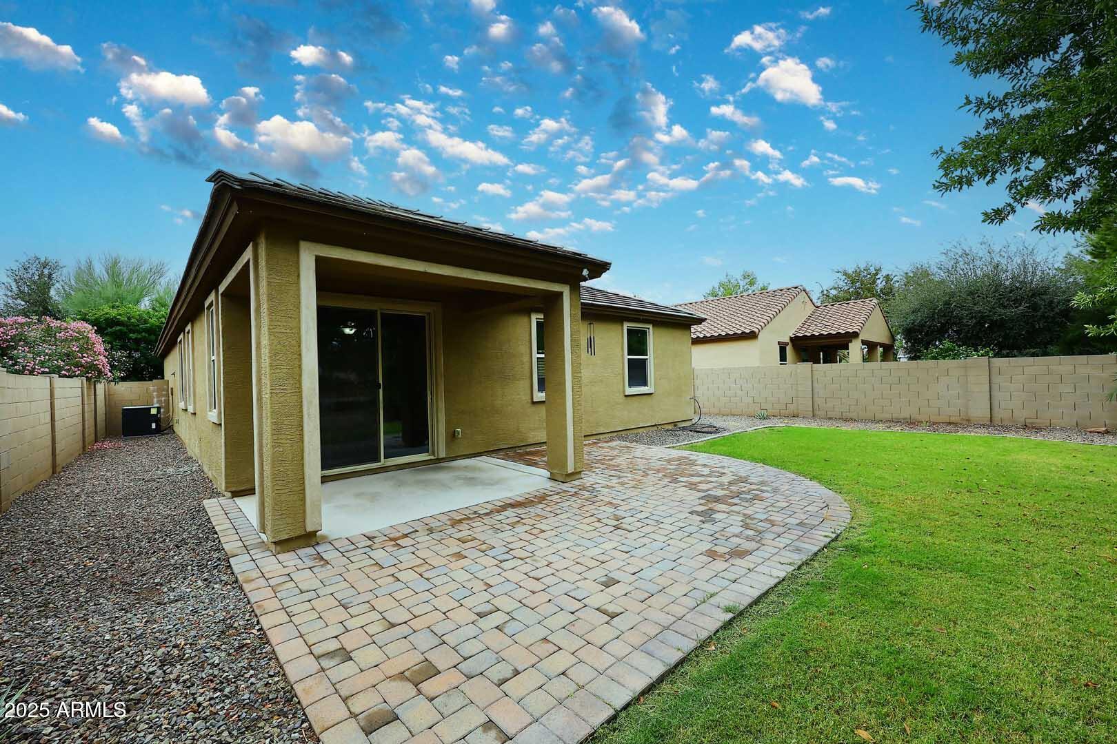 11020 East Shepperd Avenue Mesa, AZ 85212 - Photo 34 of 37 a backyard of a house with lots of green space