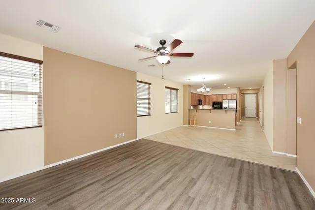 a view of a kitchen with furniture and a window