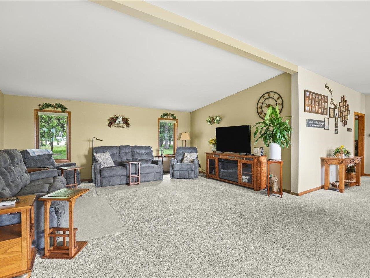 8500 Manchester Road Capron, IL 61012 - Photo 18 of 51 a living room with furniture and a flat screen tv