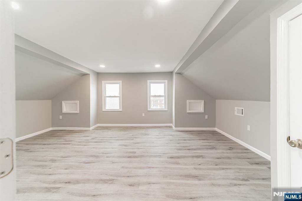 15 South Prospect Street, Unit B Verona, NJ 07044 - Photo 12 of 15 a view of an empty room with window and wooden floor