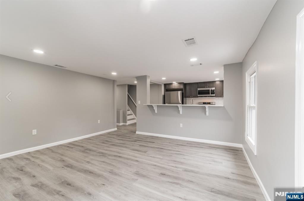 15 South Prospect Street, Unit B Verona, NJ 07044 - Photo 2 of 15 a view of a kitchen with a sink and a refrigerator