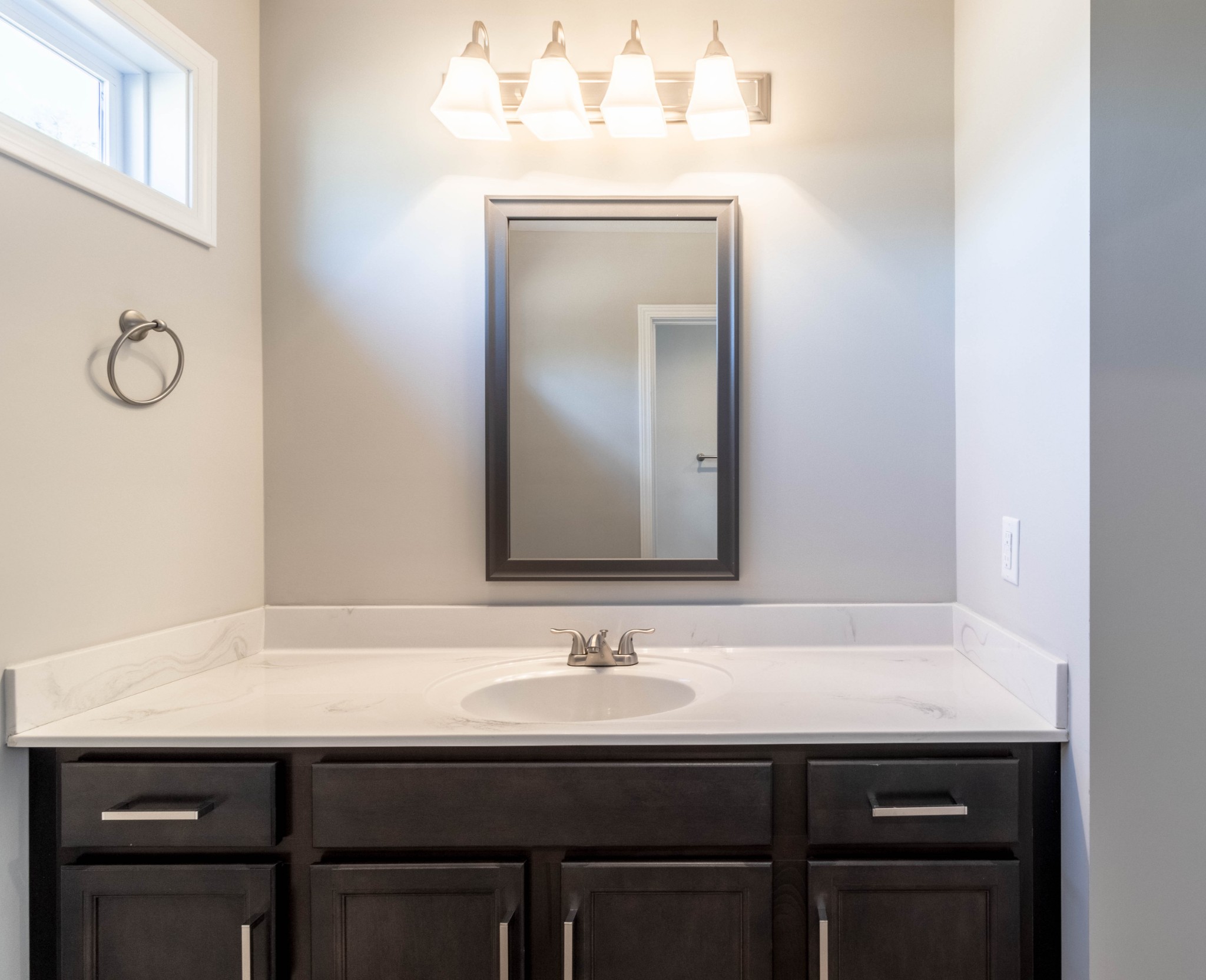 1688 Rains Road Clarksville, TN 37042 - Photo 24 of 32 a bathroom with a sink vanity and mirror