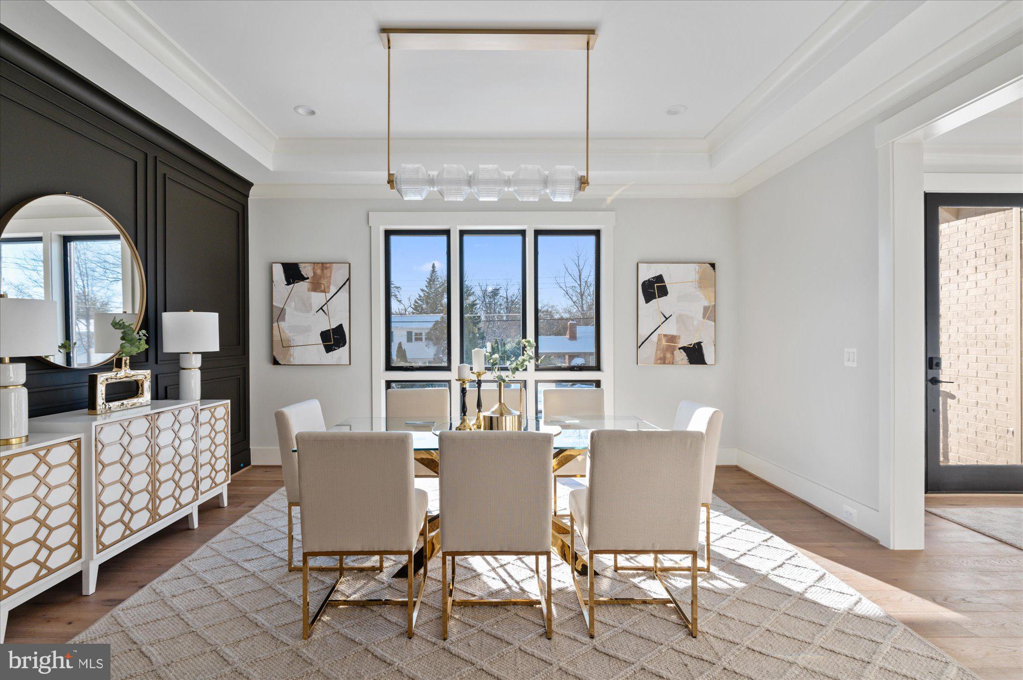 6928 Whitehall Place McLean, VA 22101 - Photo 14 of 77 a view of a dining room with furniture window and wooden floor
