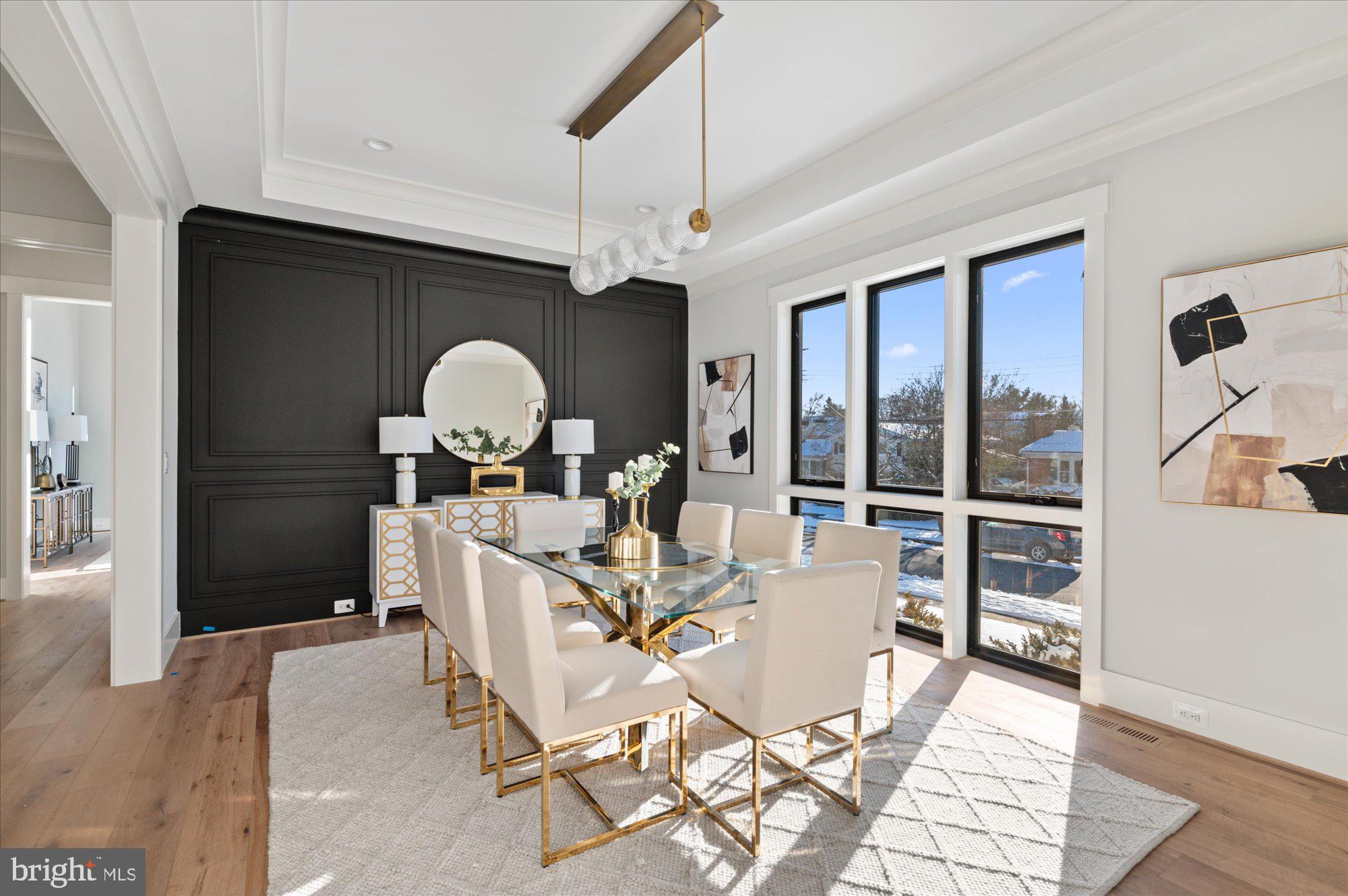 6928 Whitehall Place McLean, VA 22101 - Photo 16 of 77 a view of a dining room with furniture wooden floor and chandelier