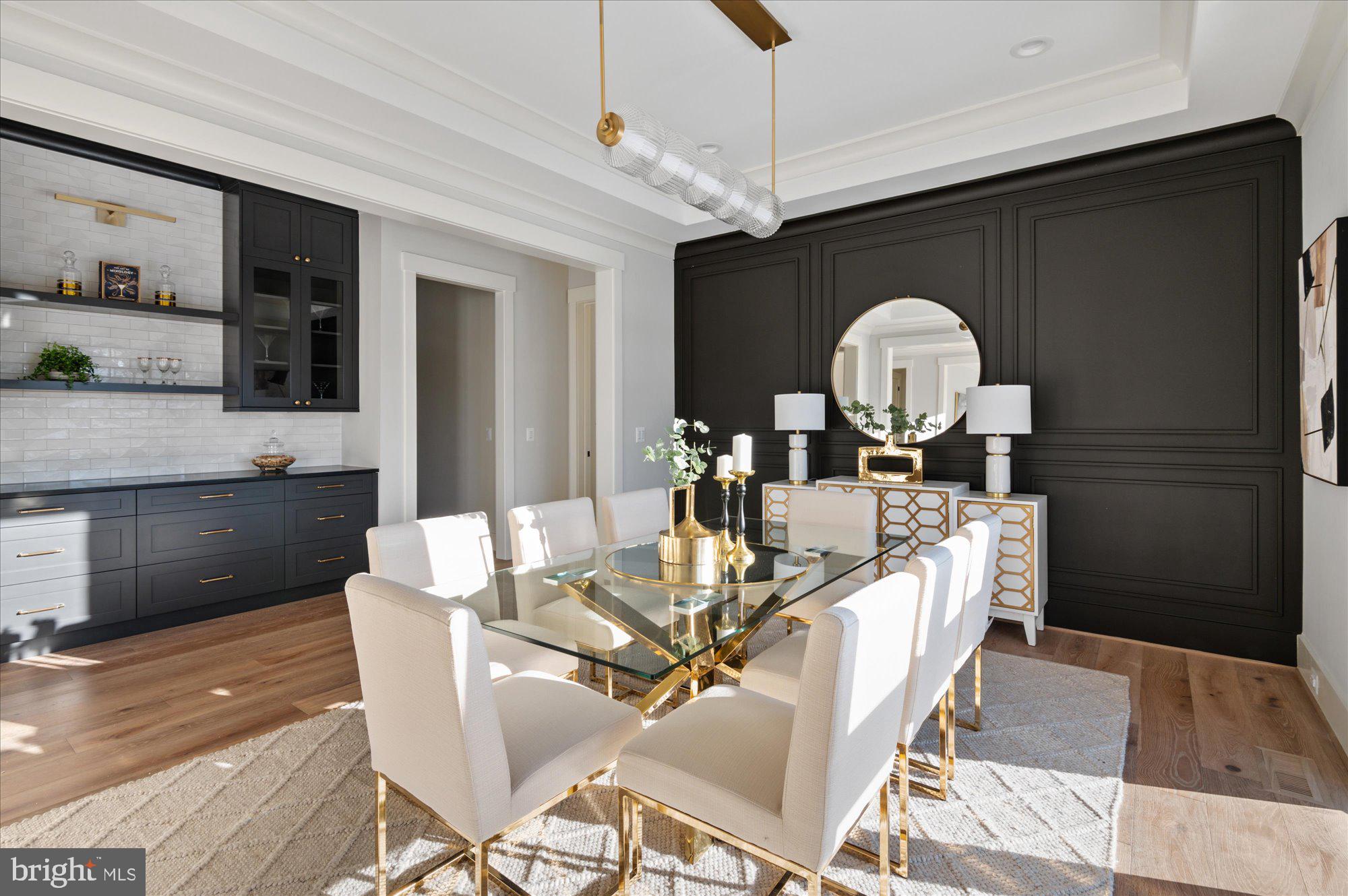6928 Whitehall Place McLean, VA 22101 - Photo 17 of 77 a view of a dining room with furniture and wooden floor