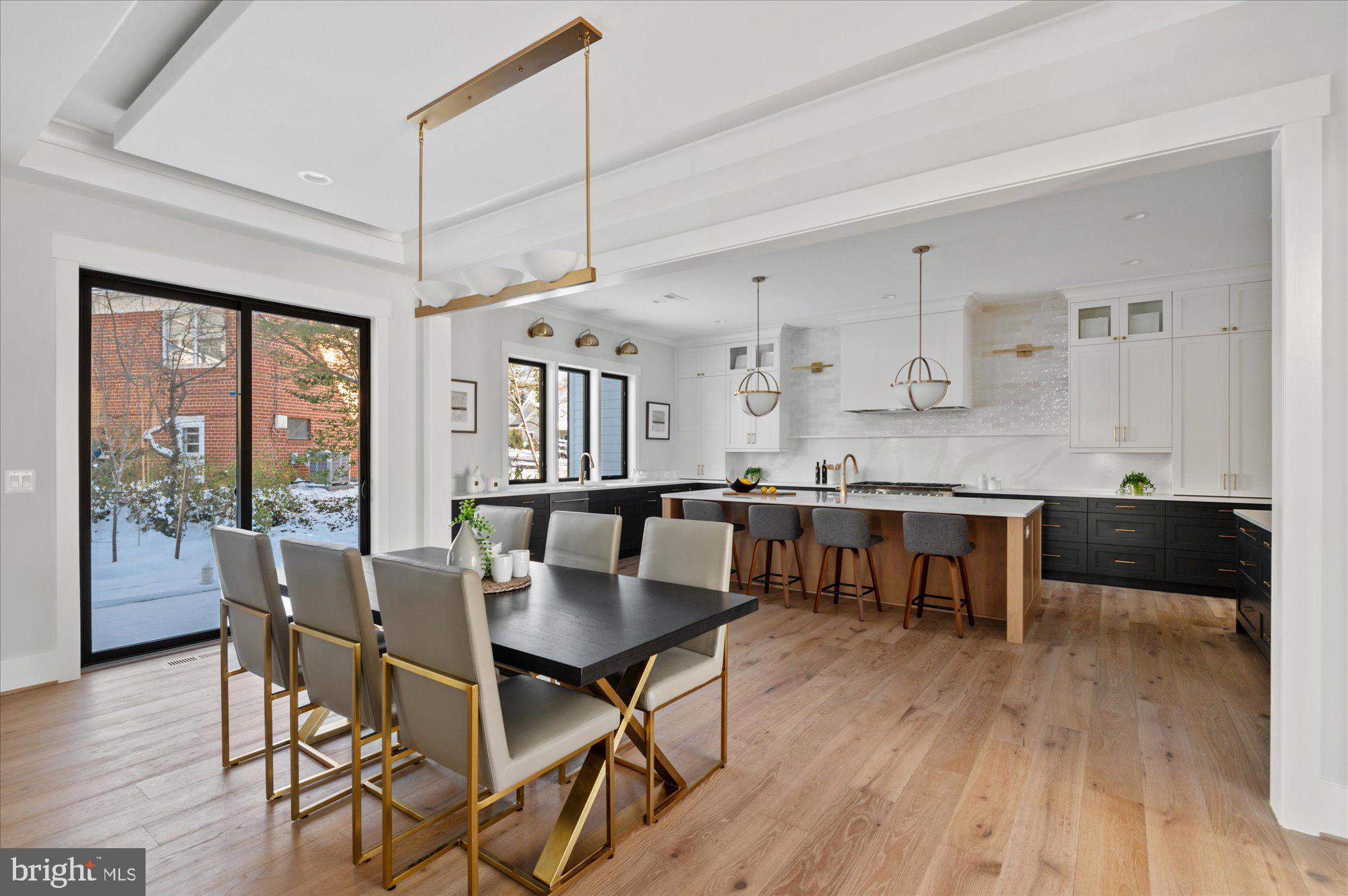 6928 Whitehall Place McLean, VA 22101 - Photo 29 of 77 a view of a dining room with furniture window and wooden floor