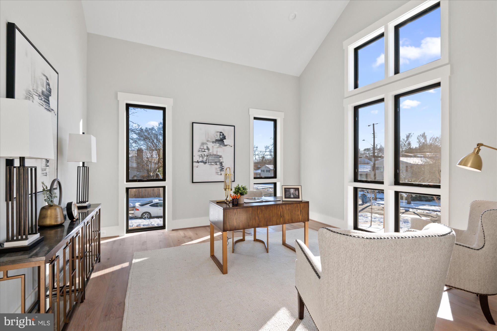 6928 Whitehall Place McLean, VA 22101 - Photo 44 of 77 a living room with furniture a piano and a flat screen tv