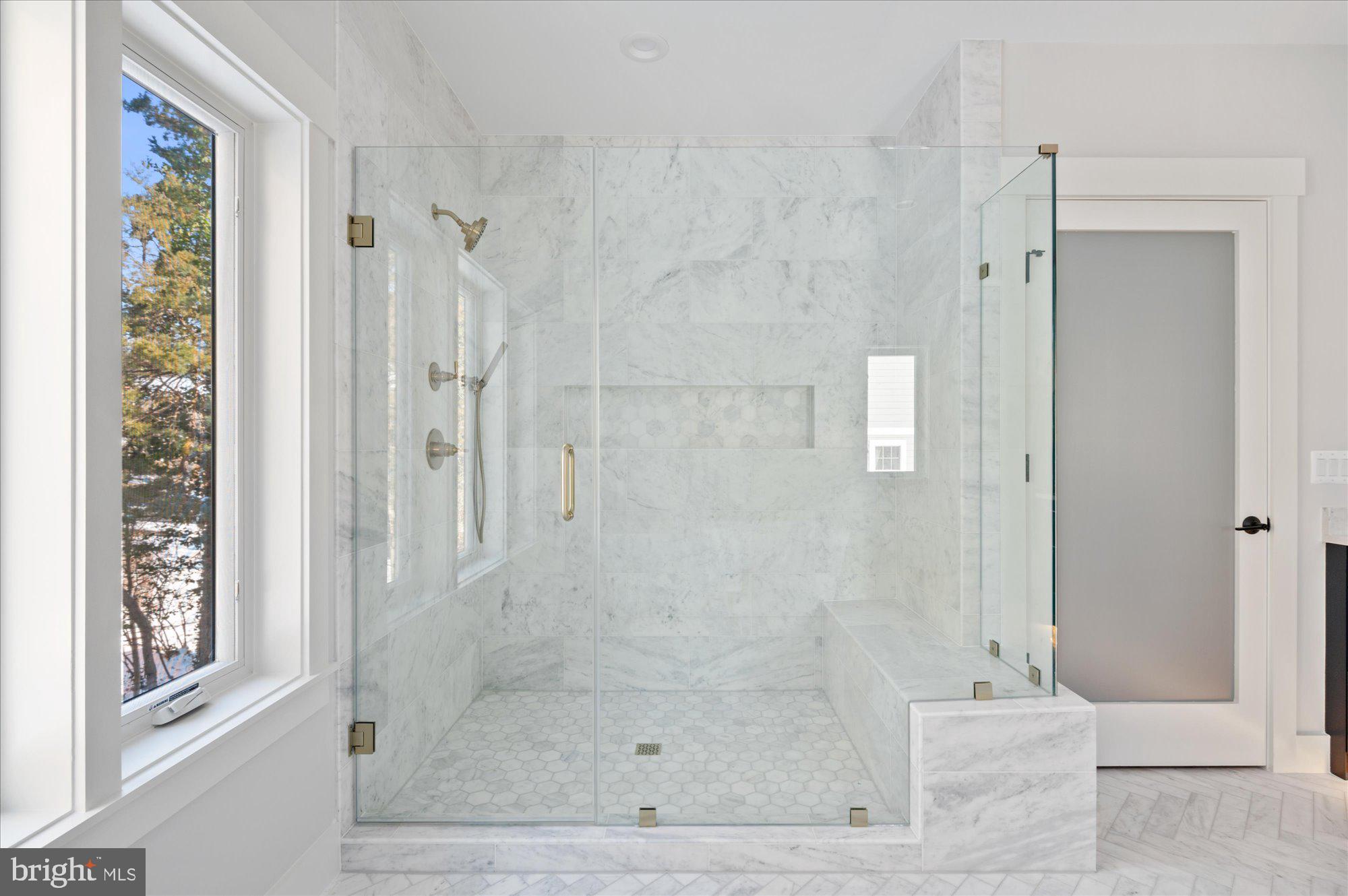 6928 Whitehall Place McLean, VA 22101 - Photo 60 of 77 a bathroom with a shower