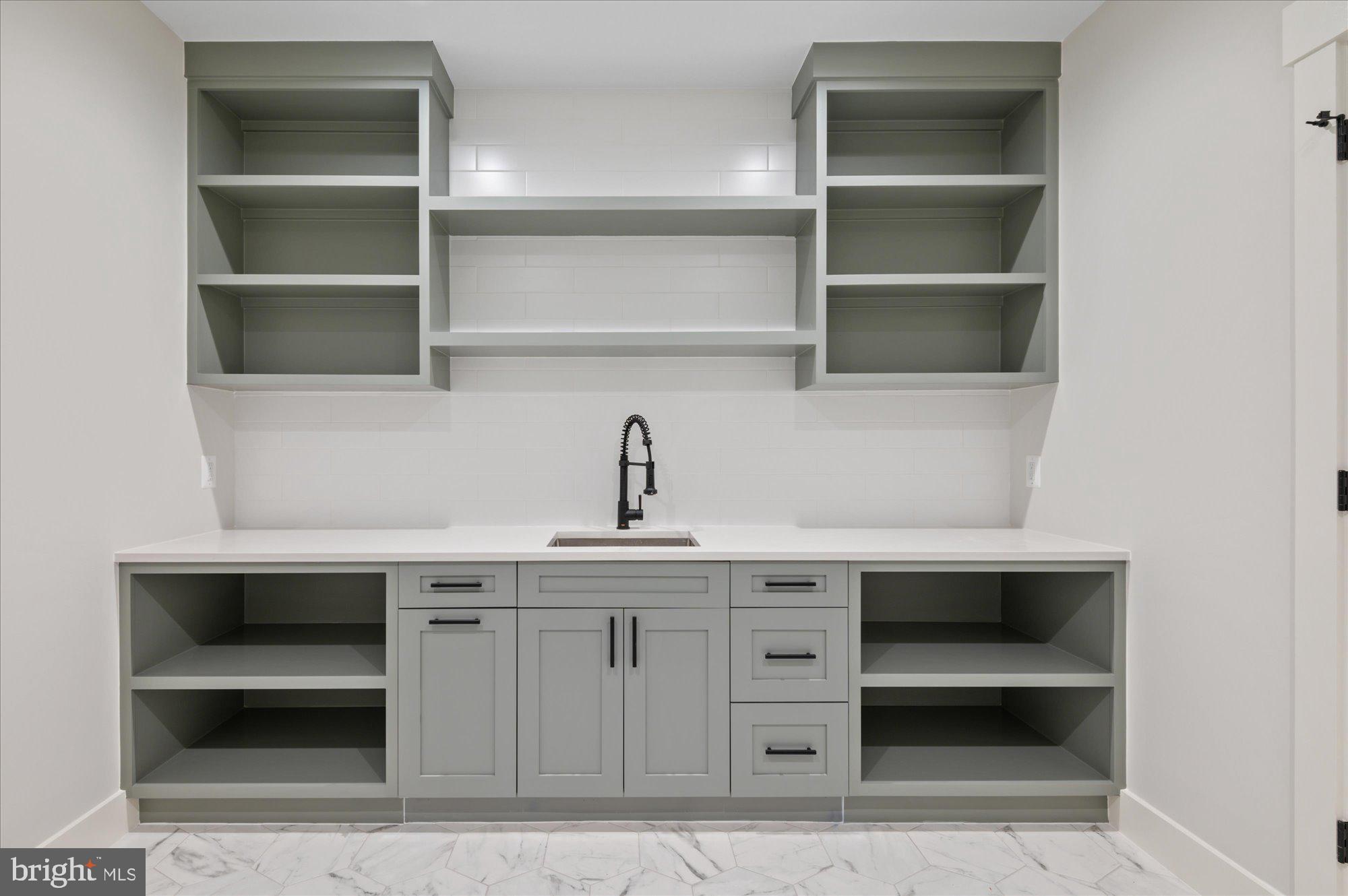 6928 Whitehall Place McLean, VA 22101 - Photo 64 of 77 a view of storage and utility room with empty racks