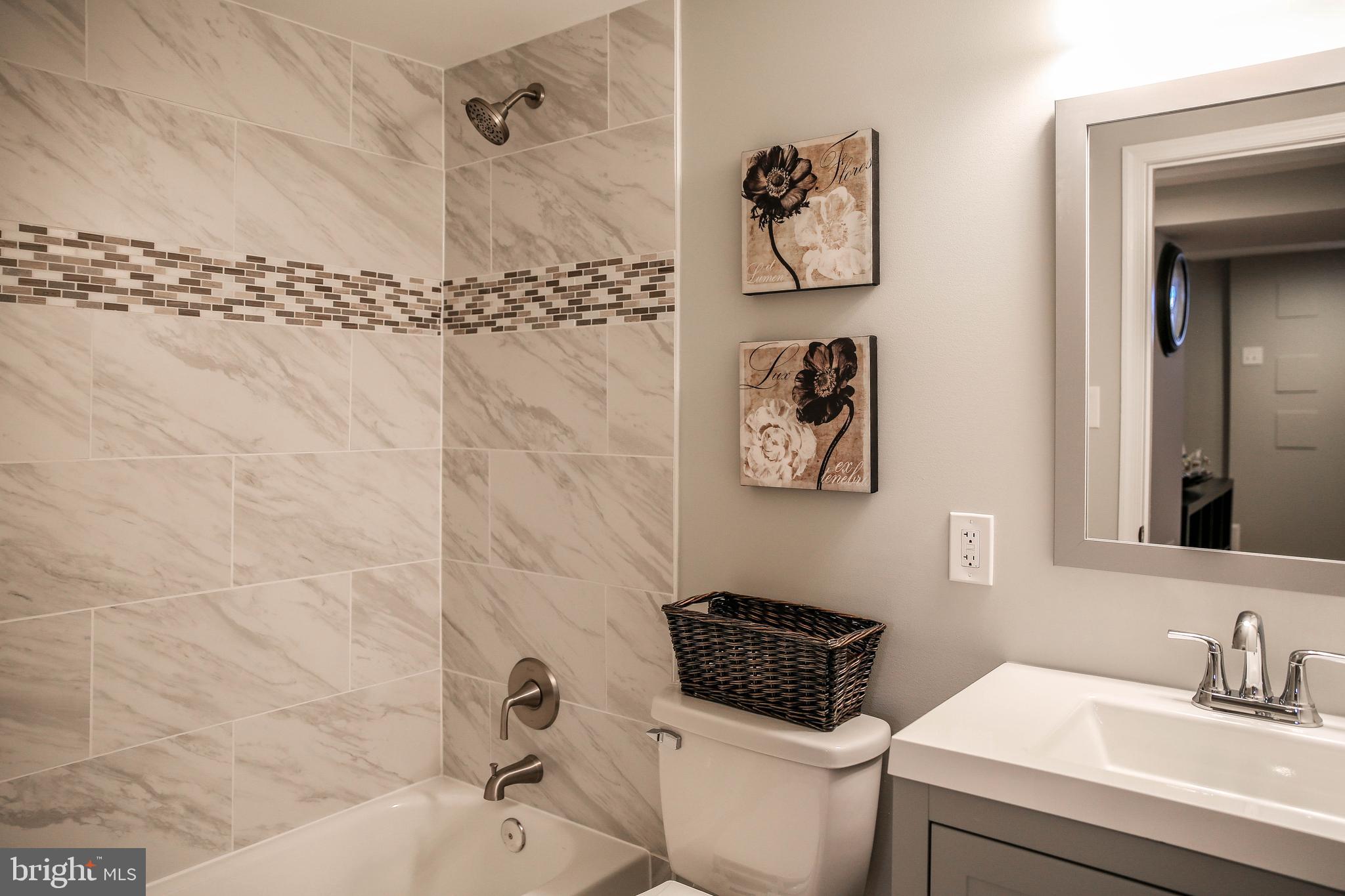 5703 Kirby Road Clinton, MD 20735 - Photo 22 of 38 Remodeled Basement Bath